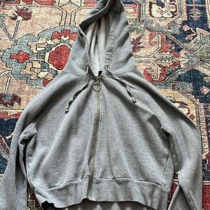Gray cropped zip up hoodie.